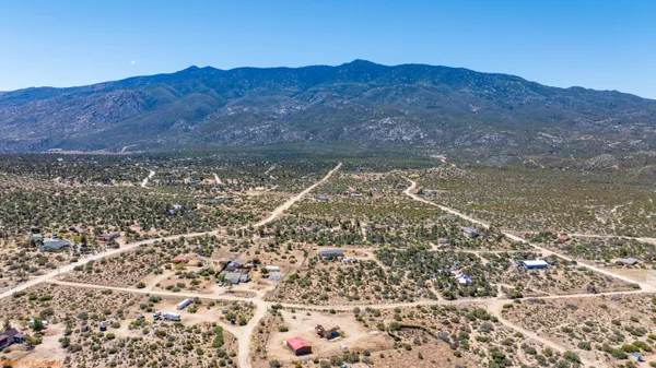 a view of a house with a mountain