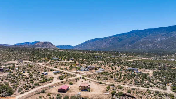 an aerial view of residential house and green space