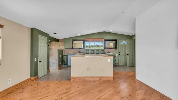 a view of a kitchen with a sink
