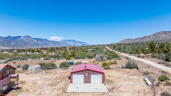 a view of a city with a mountain in the background
