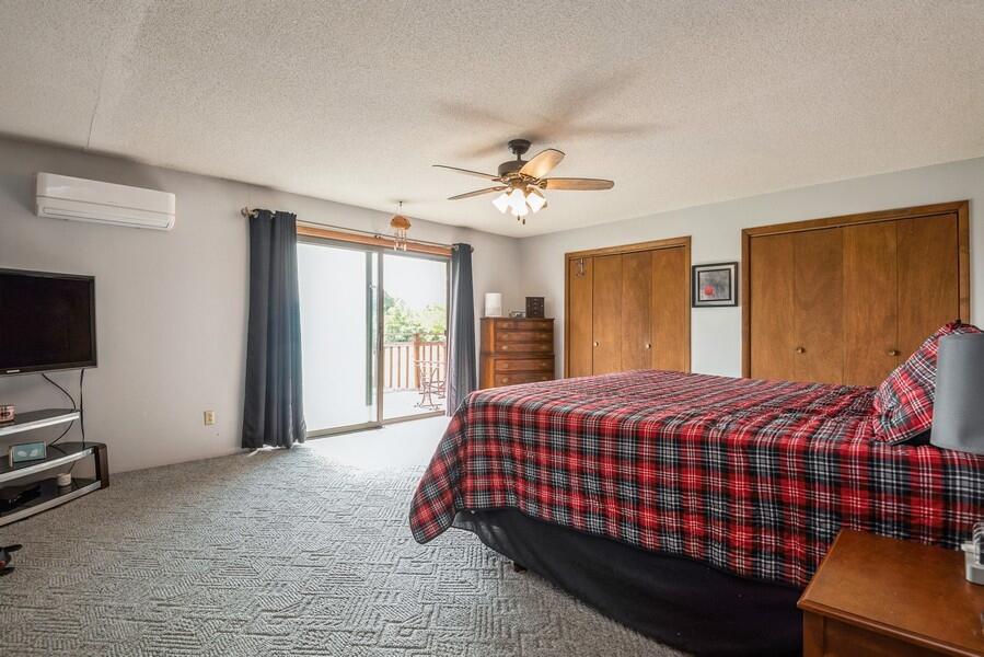 1410 Nichols Road Benton Harbor, MI 49022 - Photo 4 of 12 04_1410NicholsRd_14_PrimaryBedroom_LowRe