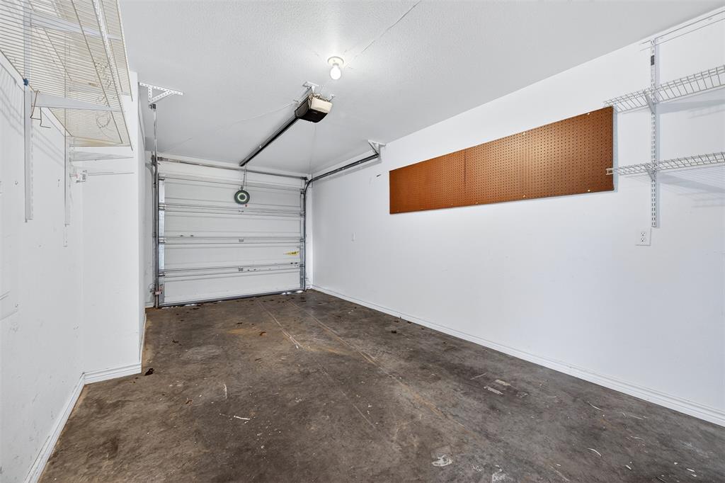 1021 Rice Street, Unit 101 Denison, TX 75020 - Photo 19 of 22 a view of a room with stairs and a ceiling fan