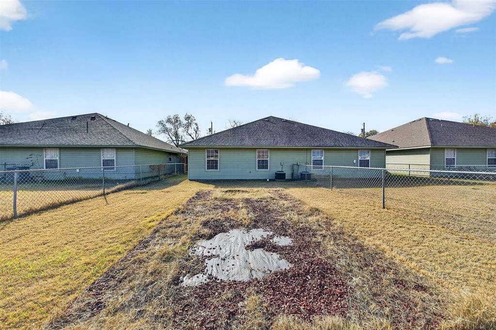 1021 Rice Street, Unit 101 Denison, TX 75020 - Photo 20 of 22 a house view with a swimming pool