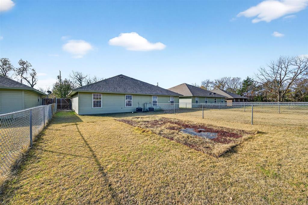 1021 Rice Street, Unit 101 Denison, TX 75020 - Photo 21 of 22 a view of swimming pool with an outdoor space