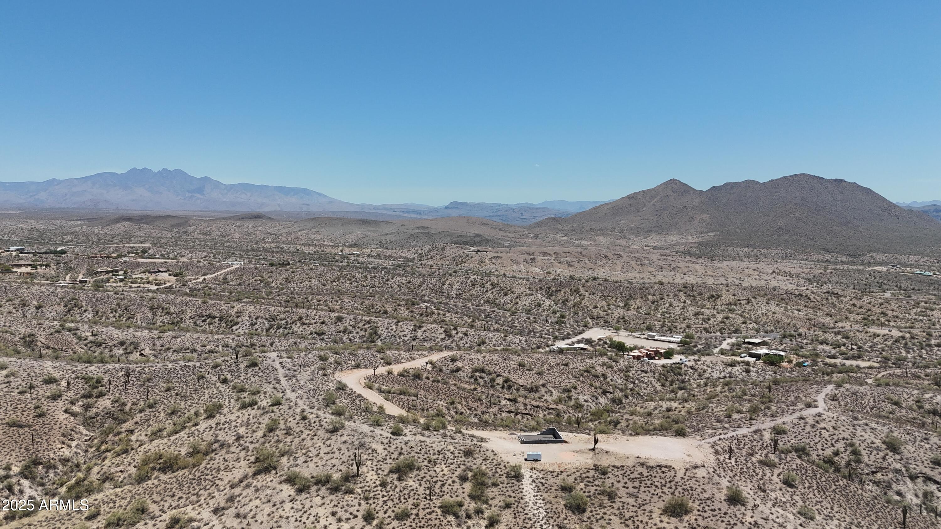 12906 North Goldfield Road, Unit 3T Fort McDowell, AZ 85264 - Photo 23 of 28 a view of a lake with mountains in the background