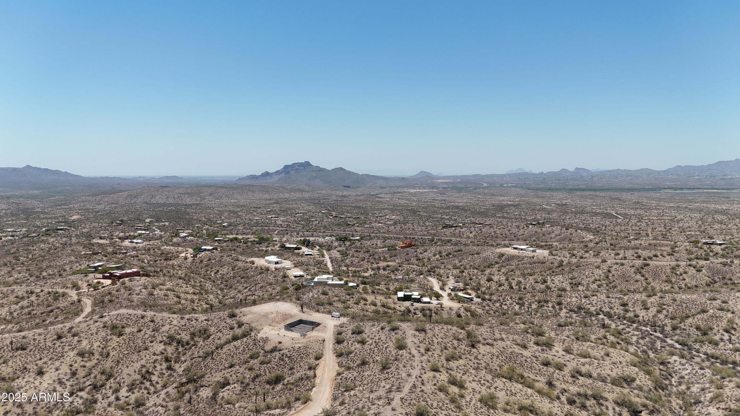 12906 North Goldfield Road, Unit 3T Fort McDowell, AZ 85264 - Photo 24 of 28 an aerial view of house with yard and mountain view in back