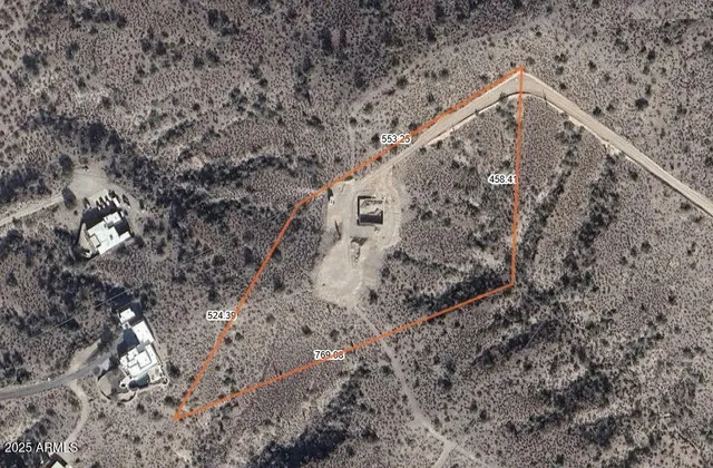 a view of a house with a mountain