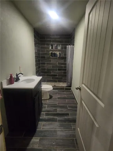 a bathroom with a sink and mirror