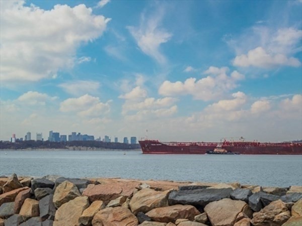 36 Ocean Avenue, Unit OCEAN VIEW Hull, MA 02045 - Photo 2 of 38 a view of a lake next to a lake