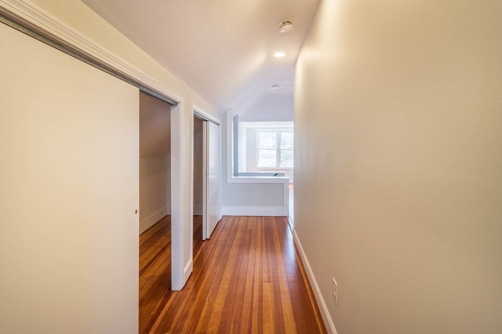 36 Ocean Avenue, Unit OCEAN VIEW Hull, MA 02045 - Photo 26 of 38 a view of a room with wooden floor