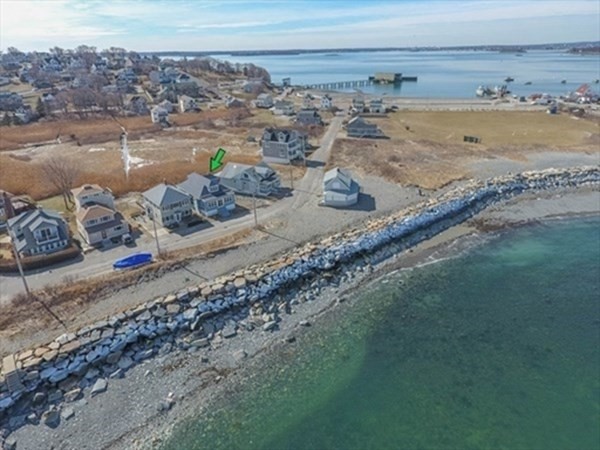 36 Ocean Avenue, Unit OCEAN VIEW Hull, MA 02045 - Photo 33 of 38 a view of a lake with a beach