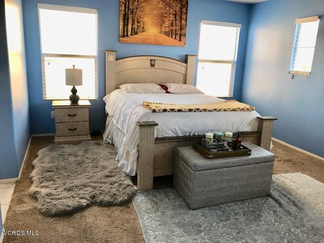 757 Navigator Way Oxnard, CA 93035 - Photo 12 of 23 a living room with furniture and a dresser