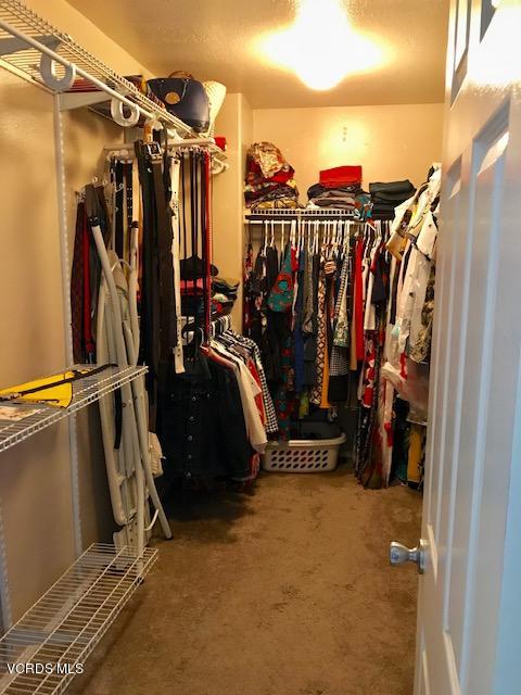 757 Navigator Way Oxnard, CA 93035 - Photo 15 of 23 a view of walk in closet with clothes
