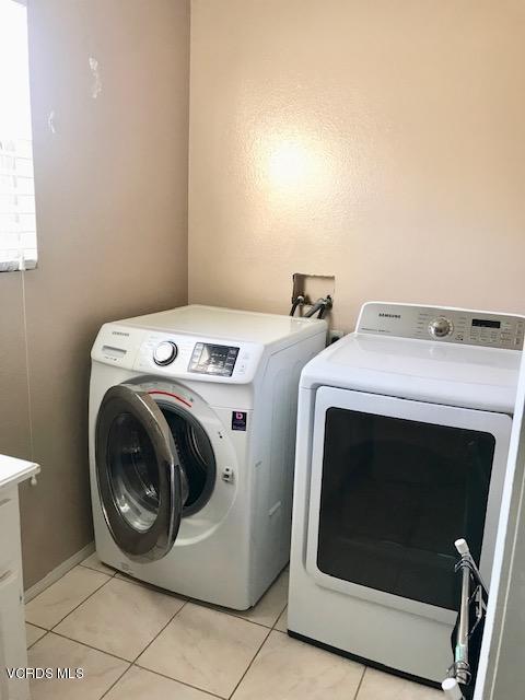 757 Navigator Way Oxnard, CA 93035 - Photo 17 of 23 a utility room with dryer and washer