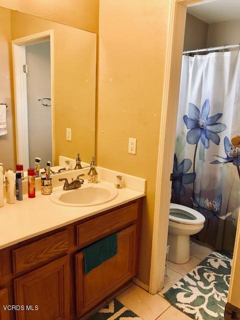 757 Navigator Way Oxnard, CA 93035 - Photo 18 of 23 a bathroom with a sink and a mirror