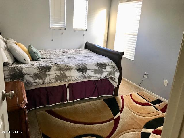757 Navigator Way Oxnard, CA 93035 - Photo 19 of 23 a bed sitting in a bedroom next to a window