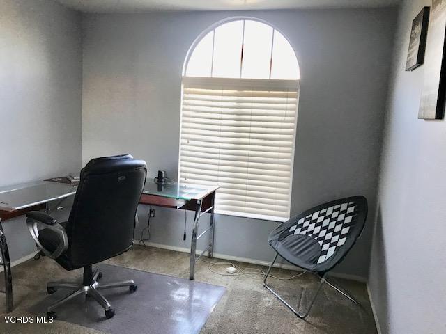 757 Navigator Way Oxnard, CA 93035 - Photo 20 of 23 a view of a workspace with furniture and a window
