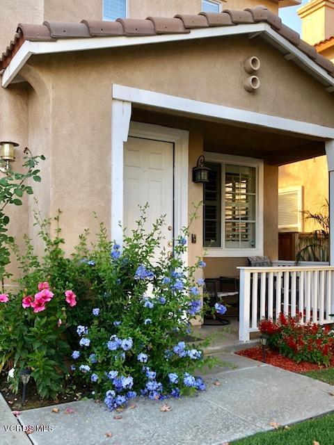 757 Navigator Way Oxnard, CA 93035 - Photo 3 of 23 a front view of a house with a yard