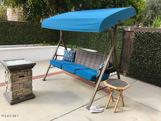 757 Navigator Way Oxnard, CA 93035 - Photo 22 of 23 a view of a chairs and table in the backyard