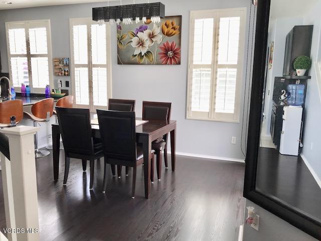 757 Navigator Way Oxnard, CA 93035 - Photo 8 of 23 a view of a dining room with furniture window and wooden floor