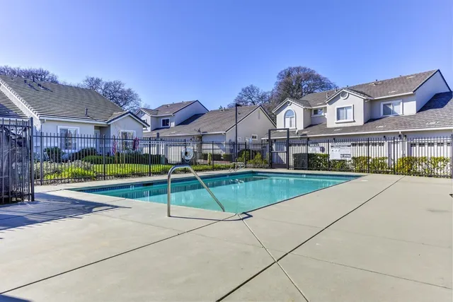 an aerial view of a house with a garden