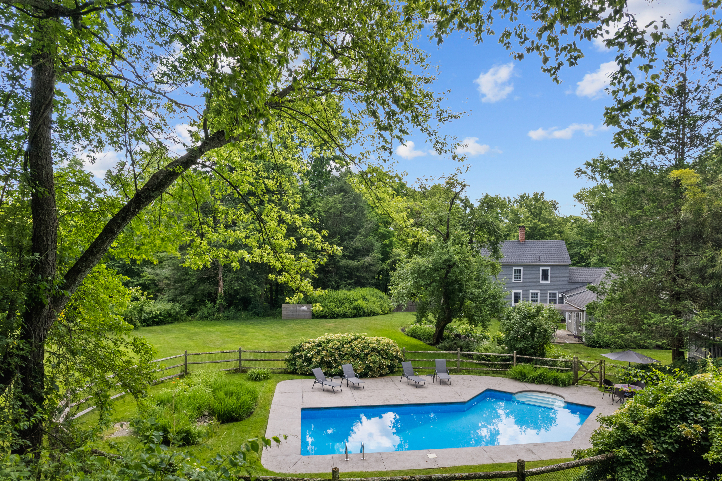 45 Picketts Ridge Road Redding, CT 06896 - Photo 1 of 1 Pool with house in background