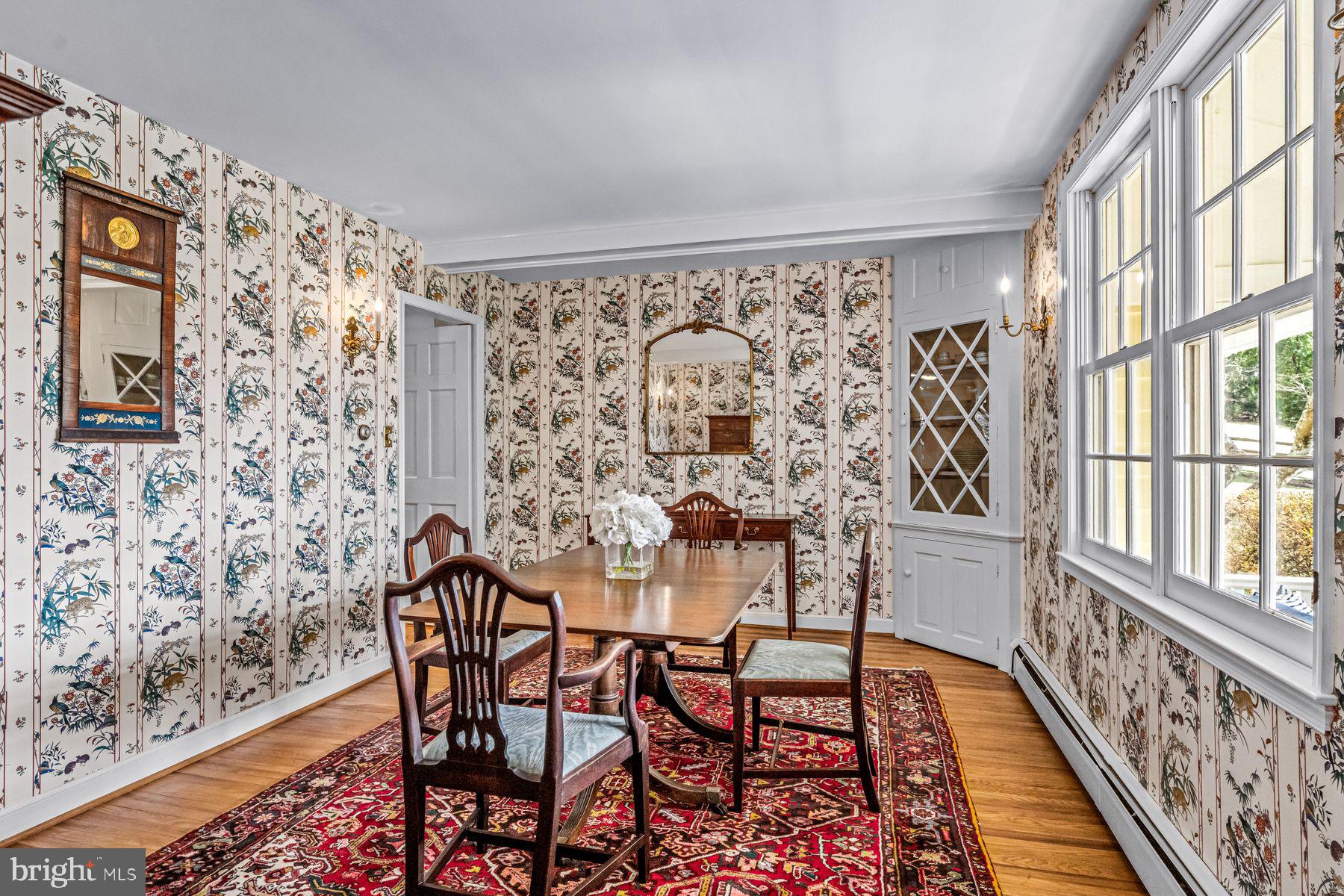 385 Church Road Devon, PA 19333 - Photo 14 of 59 a view of a dining room with furniture and a rug