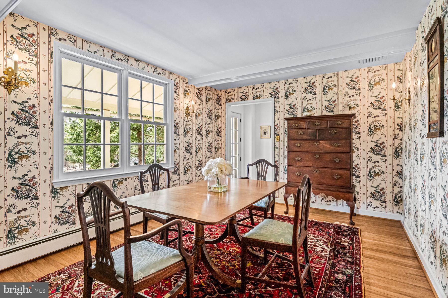 385 Church Road Devon, PA 19333 - Photo 15 of 59 a dining room with furniture and wooden floor