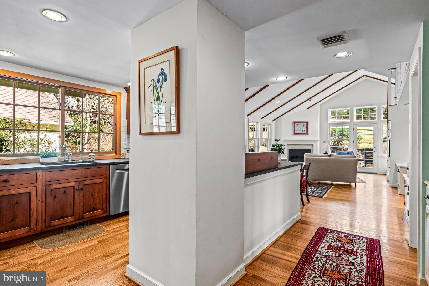 385 Church Road Devon, PA 19333 - Photo 17 of 59 a dining room with wooden floor and a window