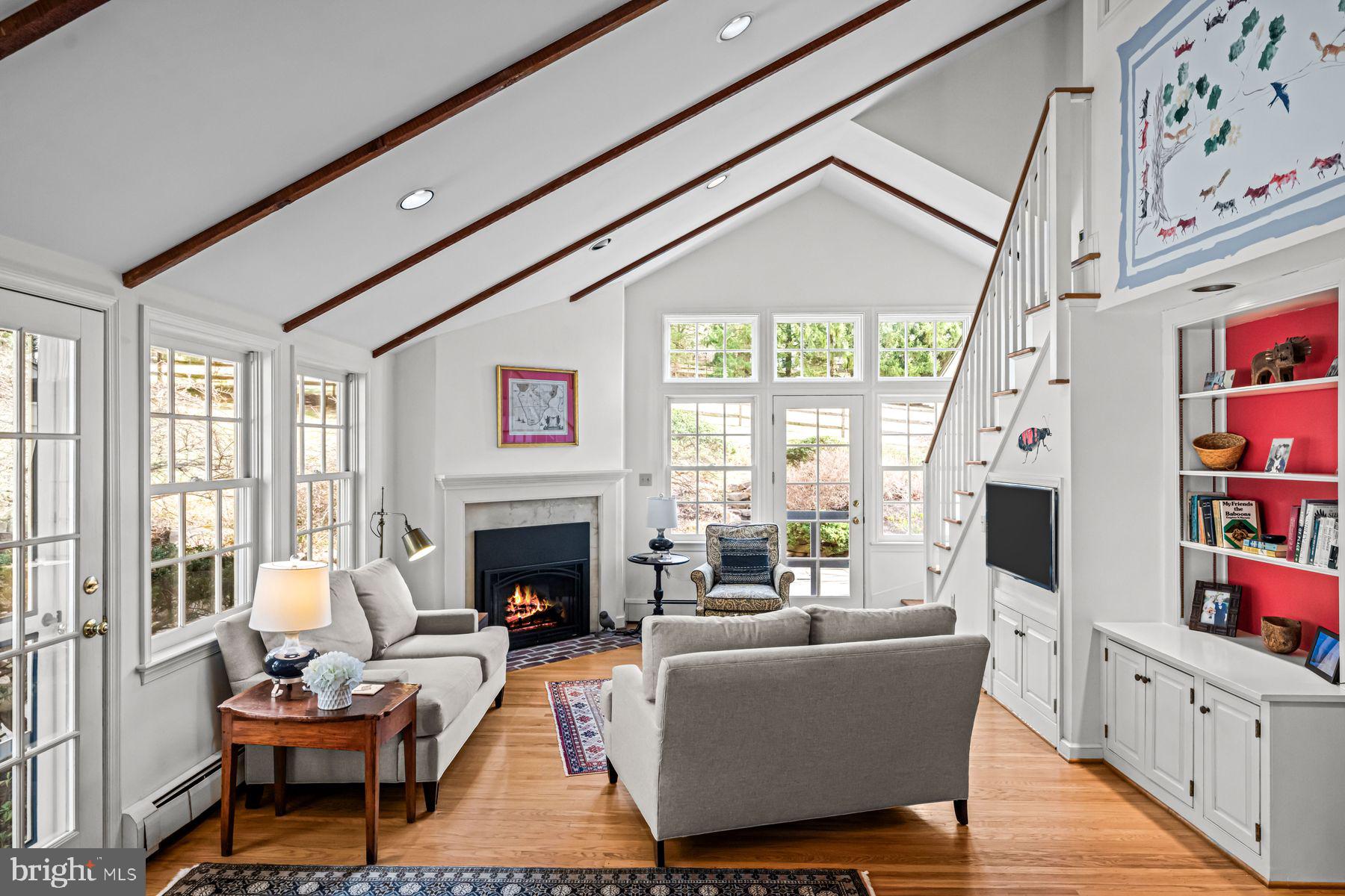 385 Church Road Devon, PA 19333 - Photo 23 of 59 a living room with fireplace furniture and a fireplace