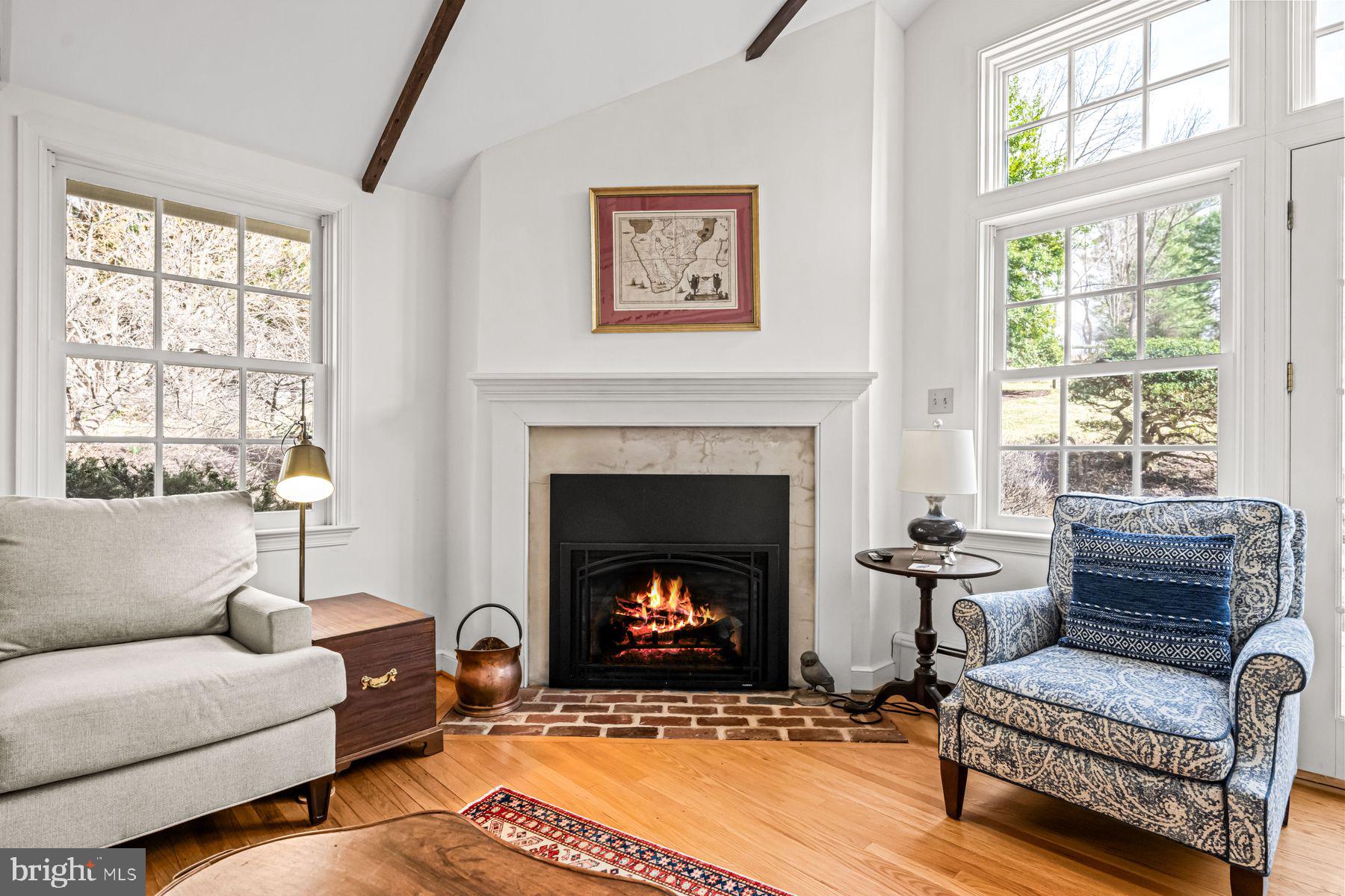 385 Church Road Devon, PA 19333 - Photo 24 of 59 a living room with furniture and a fireplace