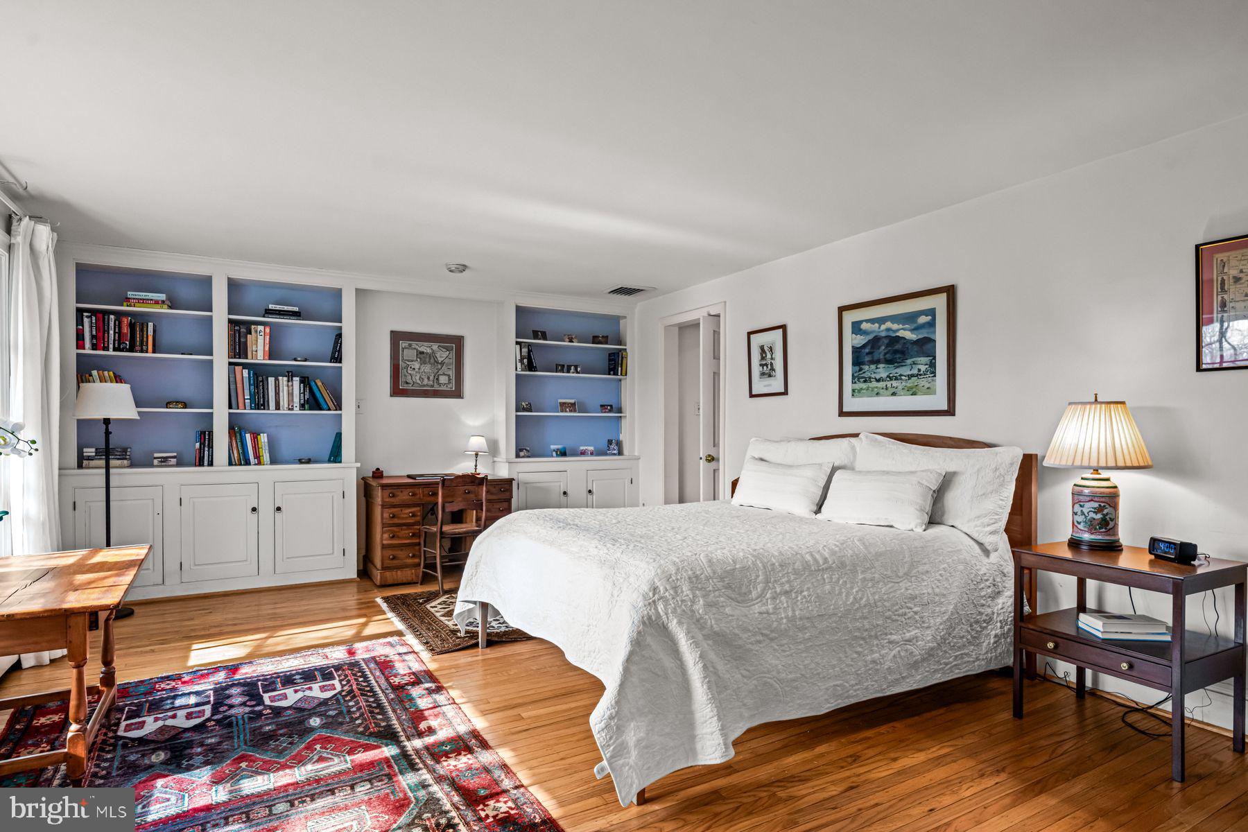 385 Church Road Devon, PA 19333 - Photo 29 of 59 a bedroom with a bed and a bookshelf