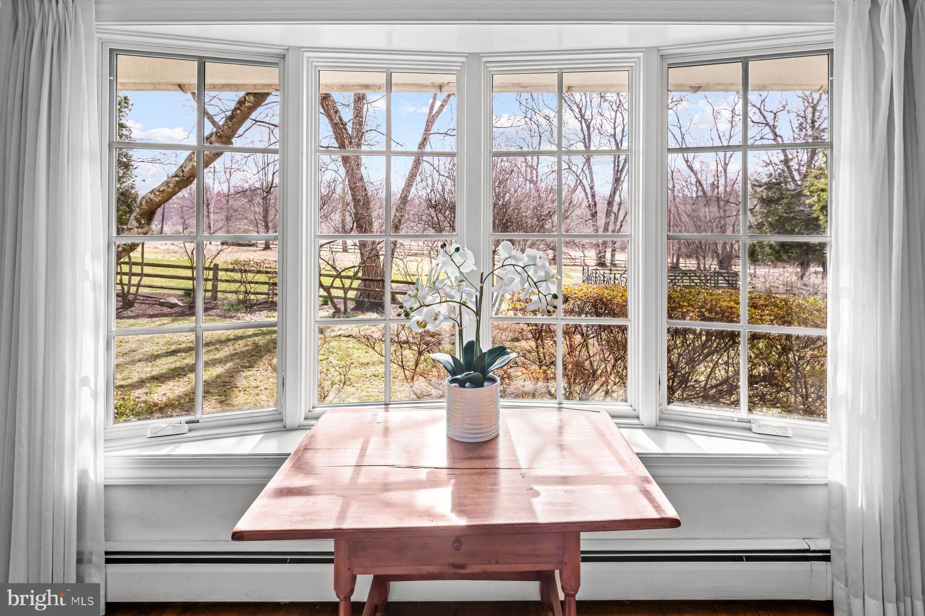 385 Church Road Devon, PA 19333 - Photo 30 of 59 a view of a dining room with a table and chairs