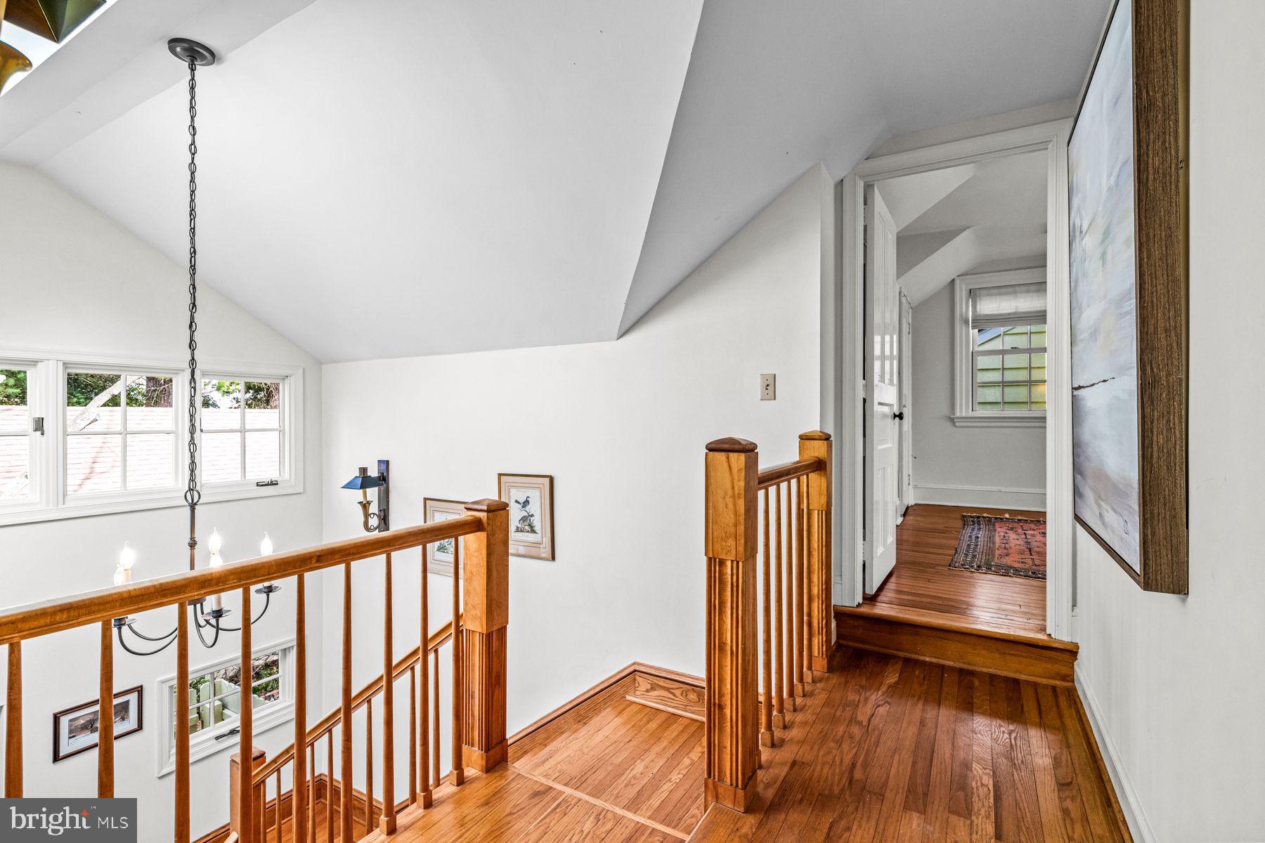 385 Church Road Devon, PA 19333 - Photo 40 of 59 a view of a hallway with wooden floor and staircase