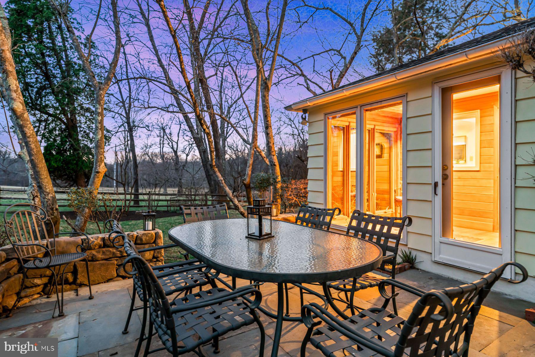 385 Church Road Devon, PA 19333 - Photo 4 of 59 a backyard of a house with outdoor seating