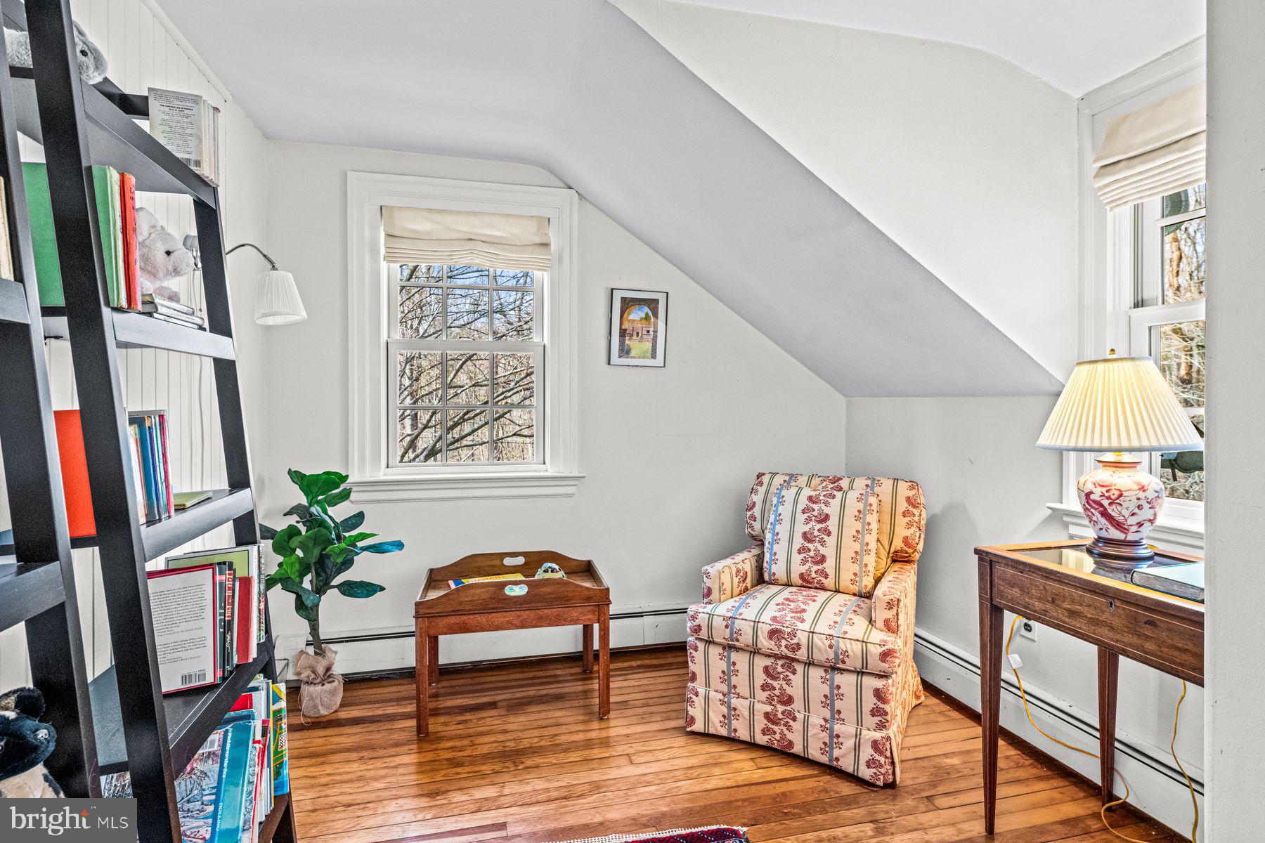 385 Church Road Devon, PA 19333 - Photo 49 of 59 a living room with furniture and a potted plant