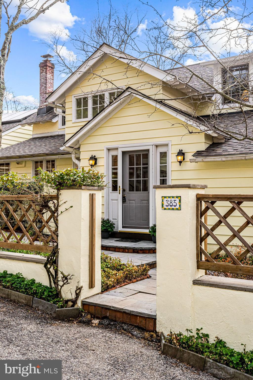 385 Church Road Devon, PA 19333 - Photo 7 of 59 a front view of a house with a yard