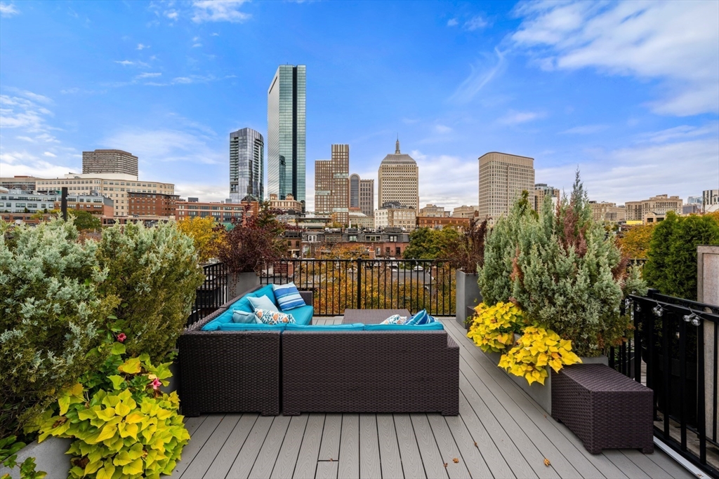 44 Appleton Street Boston, MA 02116 - Photo 27 of 33 a view of a balcony with wooden benches