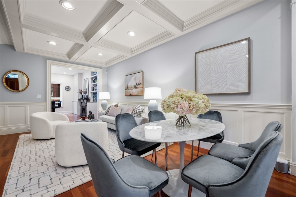 44 Appleton Street Boston, MA 02116 - Photo 3 of 33 a living room with furniture kitchen view and a large mirror