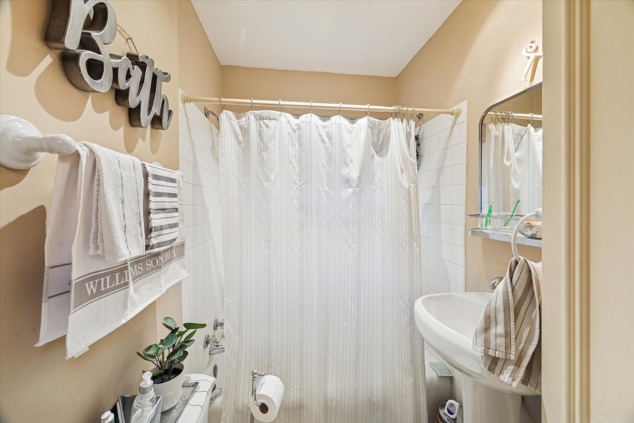 4207 Drake Street Houston, TX 77005 - Photo 19 of 24 a view of a room with window and furniture