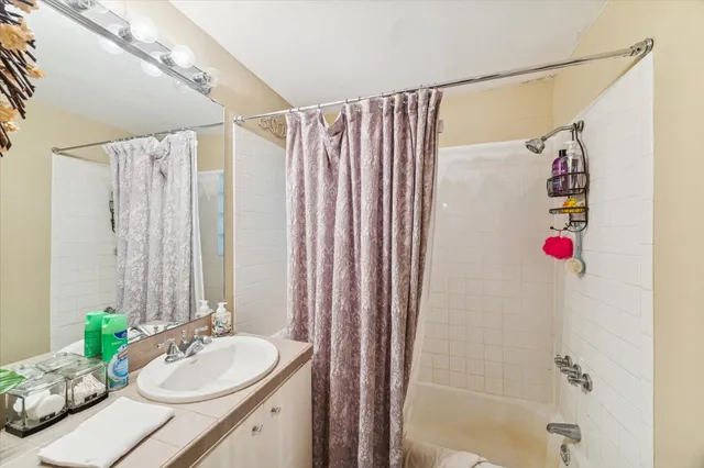 a swimming pool with outdoor seating and yard