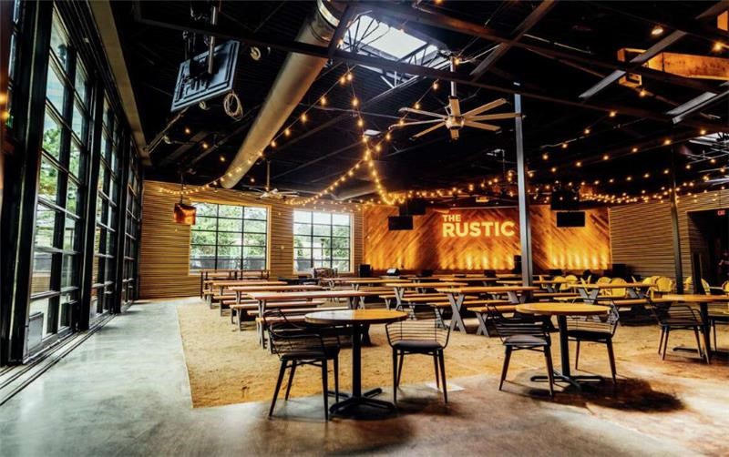 4207 Drake Street Houston, TX 77005 - Photo 23 of 24 a view of an empty room with wooden floor and windows