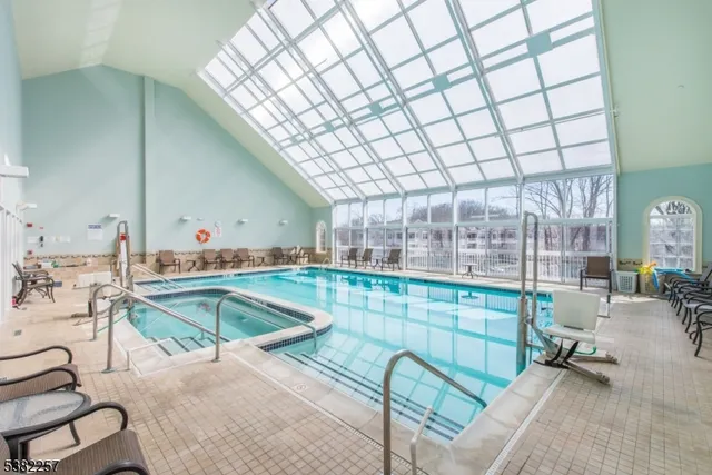 a room with lots of tables and chairs