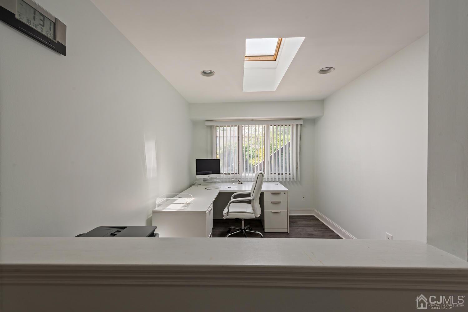 73 Appletree Road Howell, NJ 07731 - Photo 20 of 43 a view of a car in a room