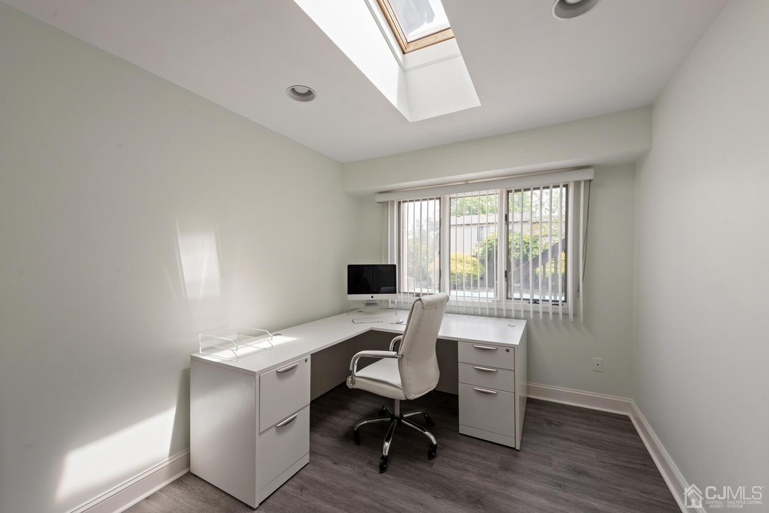 73 Appletree Road Howell, NJ 07731 - Photo 21 of 43 a view of a workspace with furniture and a window