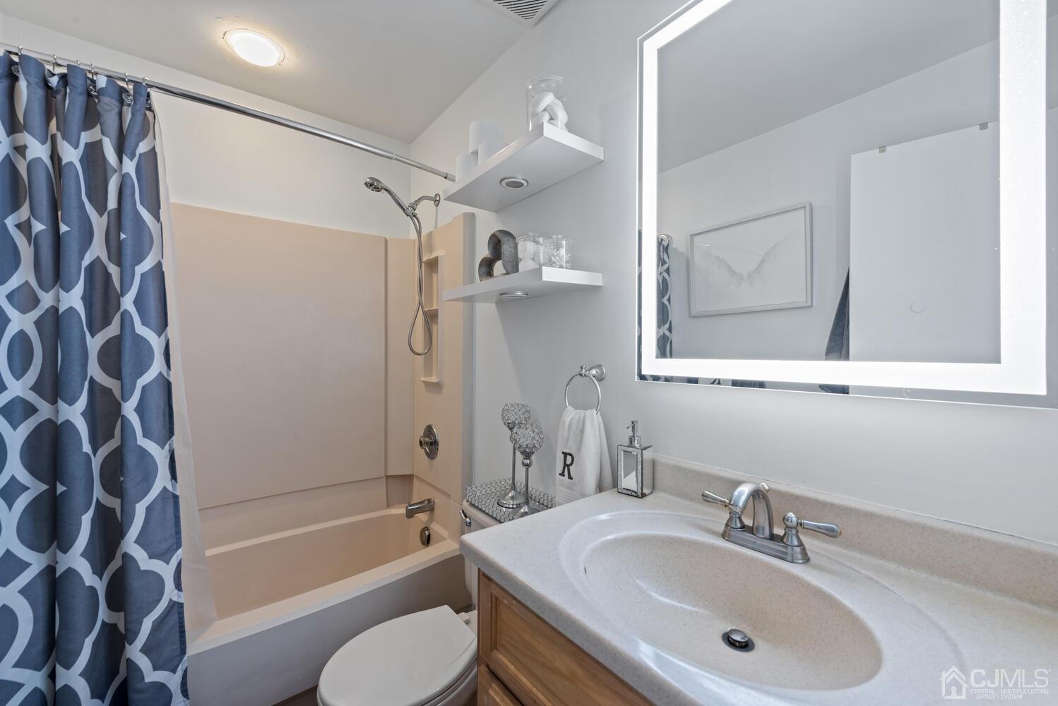 73 Appletree Road Howell, NJ 07731 - Photo 31 of 43 a bathroom with a sink toilet and shower