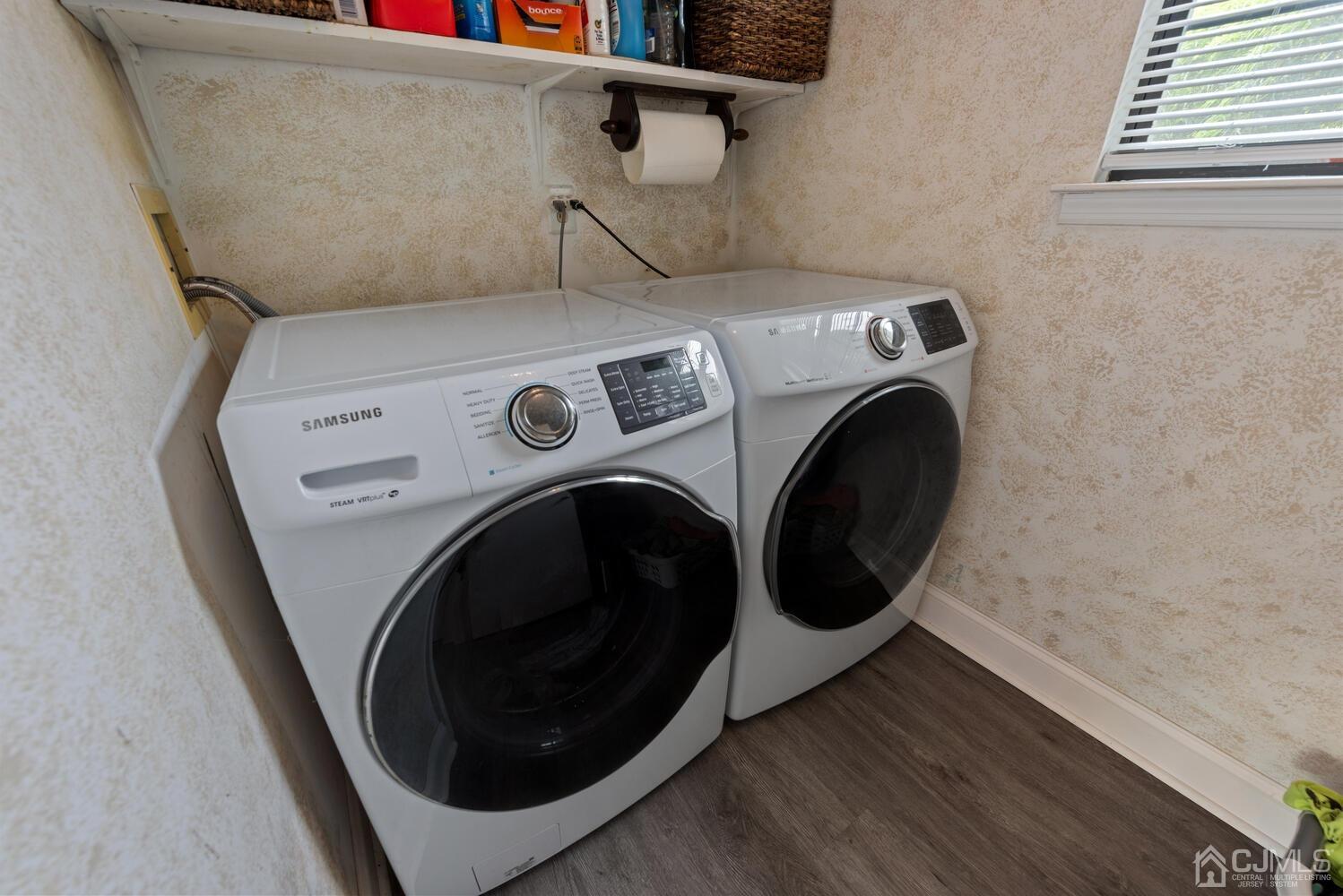 73 Appletree Road Howell, NJ 07731 - Photo 32 of 43 a utility room with dryer and washer