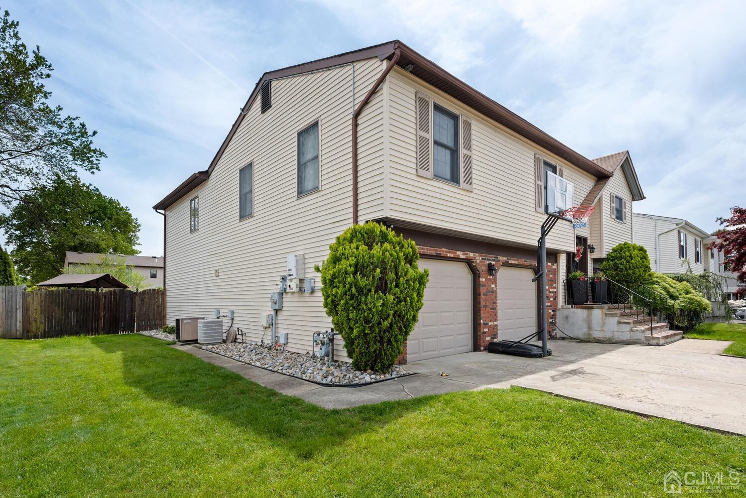 73 Appletree Road Howell, NJ 07731 - Photo 5 of 43 a view of a house with backyard