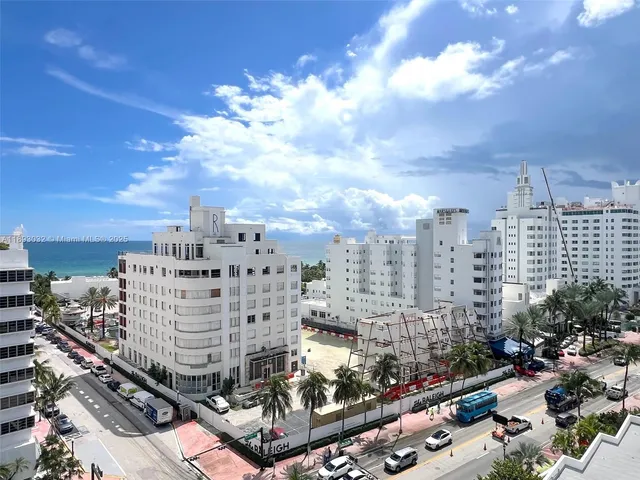 a view of a city with tall buildings