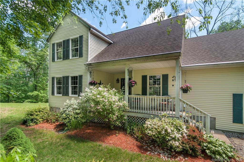 81 Benjamin Road Preston, CT 06365 - Photo 1 of 1 a front view of a house with a garden